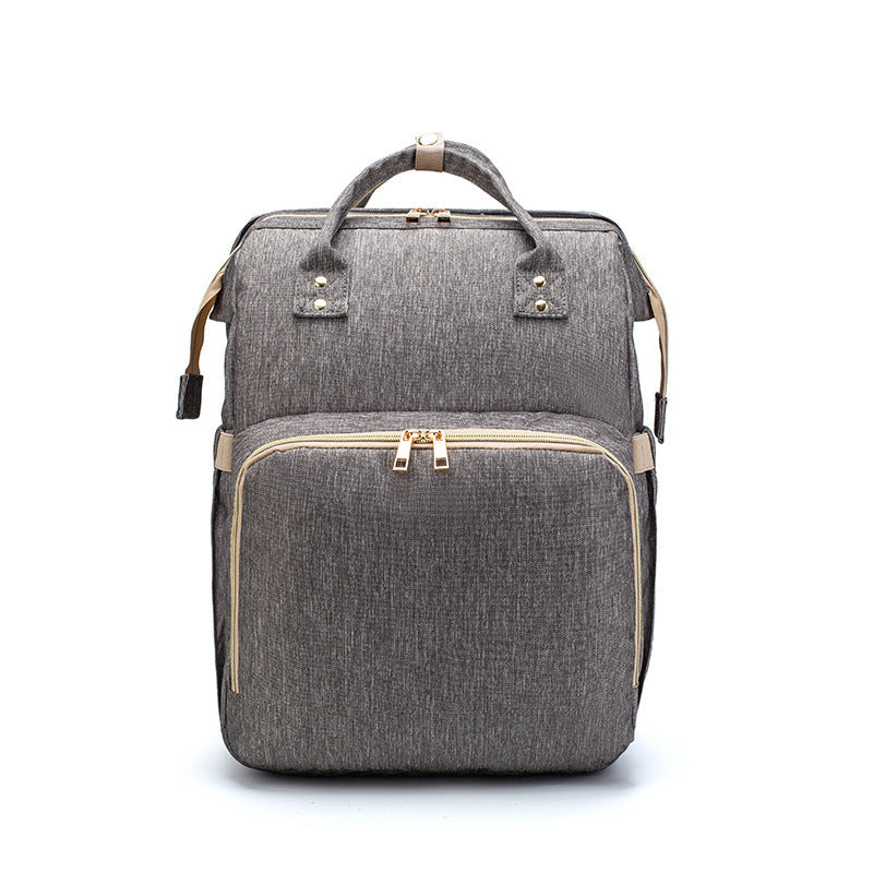 Компактный складной рюкзак-кроватка для детской кроватки с USB-портом.