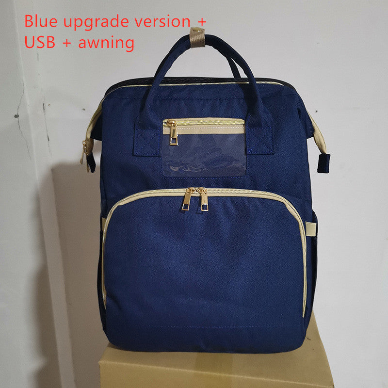 Компактный складной рюкзак-кроватка для детской кроватки с USB-портом.