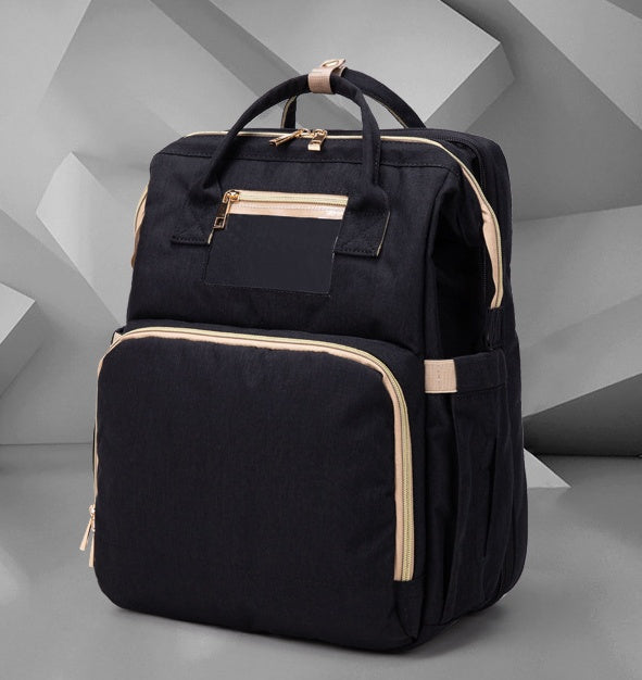 Компактный складной рюкзак-кроватка для детской кроватки с USB-портом.