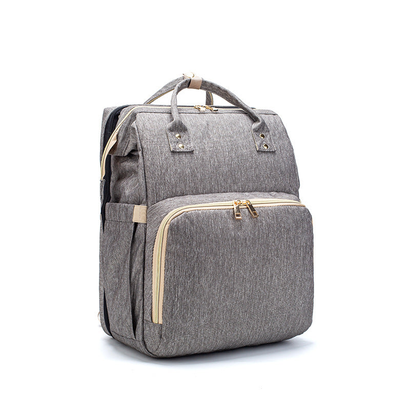 Компактный складной рюкзак-кроватка для детской кроватки с USB-портом.