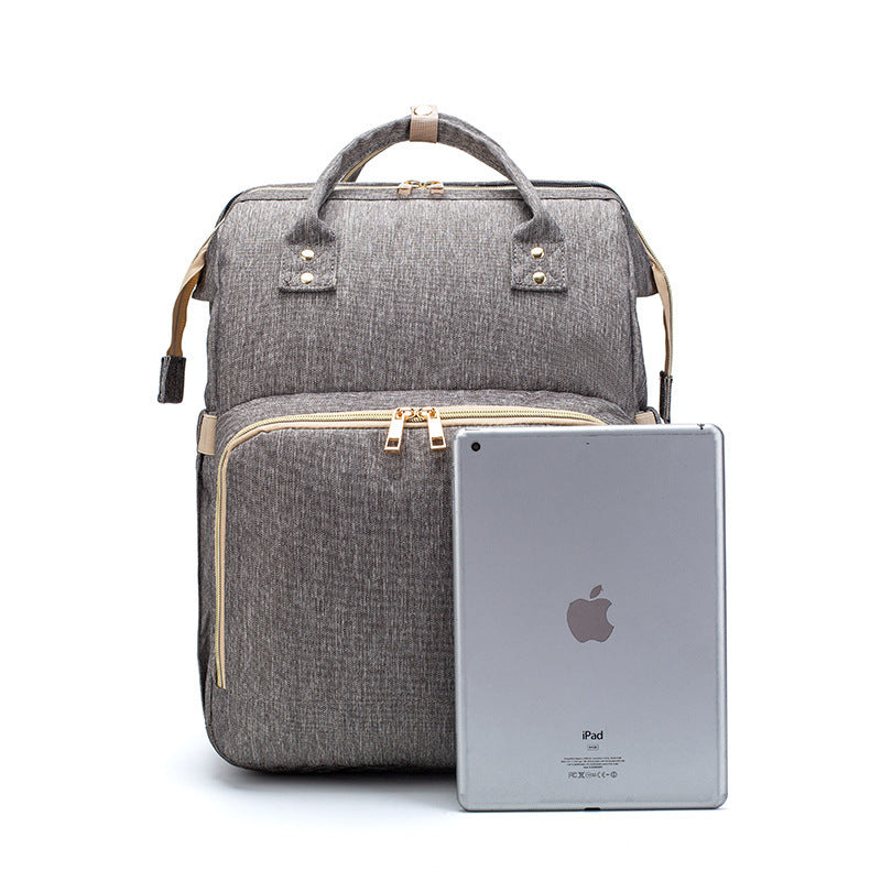 Компактный складной рюкзак-кроватка для детской кроватки с USB-портом.