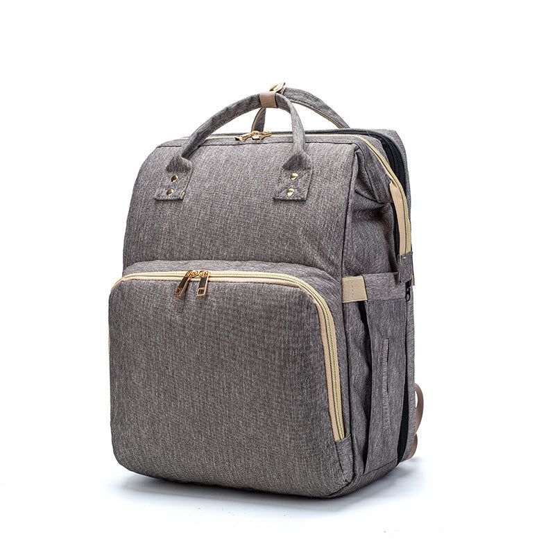 Компактный складной рюкзак-кроватка для детской кроватки с USB-портом.